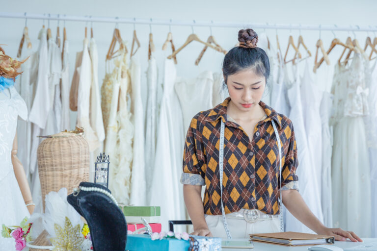 Clothing designer woman working in her small business office